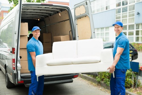 Removal team sorting recyclable materials during a Croydon clearance