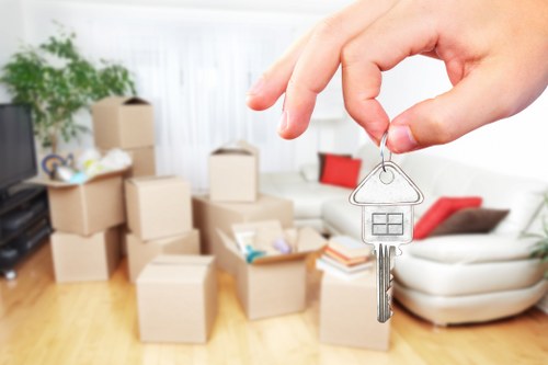 Moving team handling furniture carefully during a Croydon house move