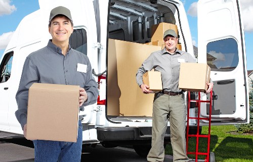 Packed boxes and furniture ready for local removals