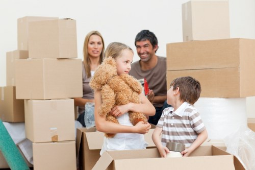 House movers navigating access at a suburban property